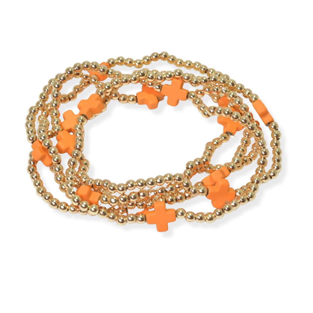 Multi layered gold bead stretch bracelet with cross accent n