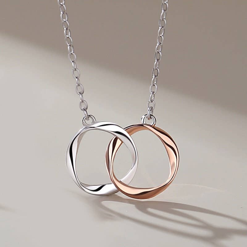 Interlocking Mobius Couple Necklace in 925 Sterling Silver