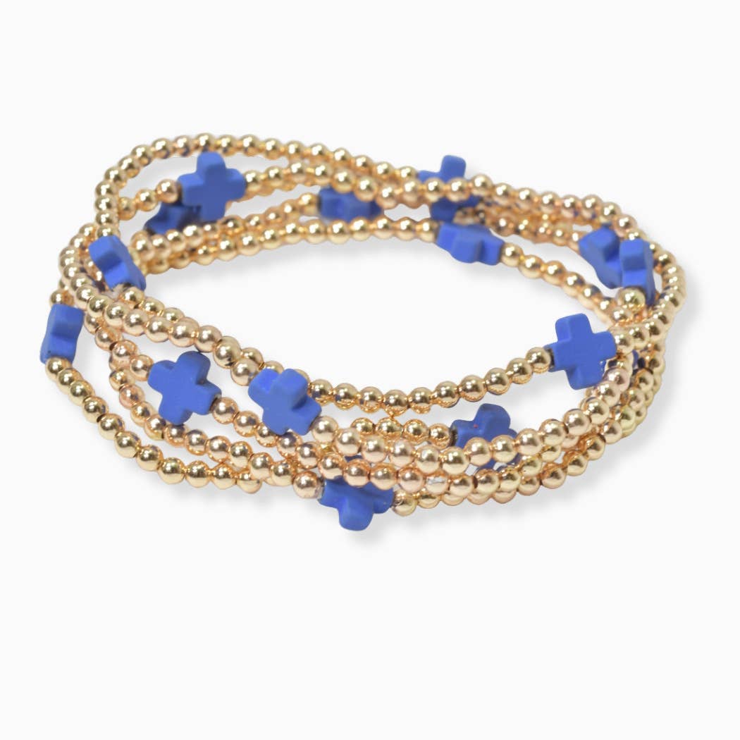 Multi layered gold bead stretch bracelet with cross accent n