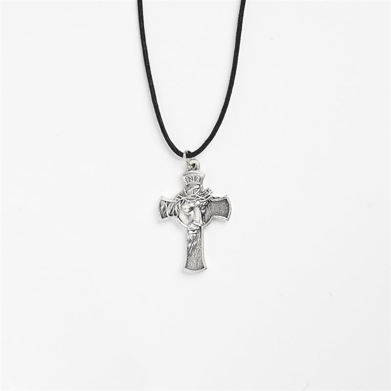 Cross / face of Christ / cord