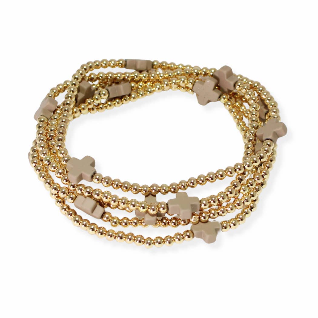 Multi layered gold bead stretch bracelet with cross accent n