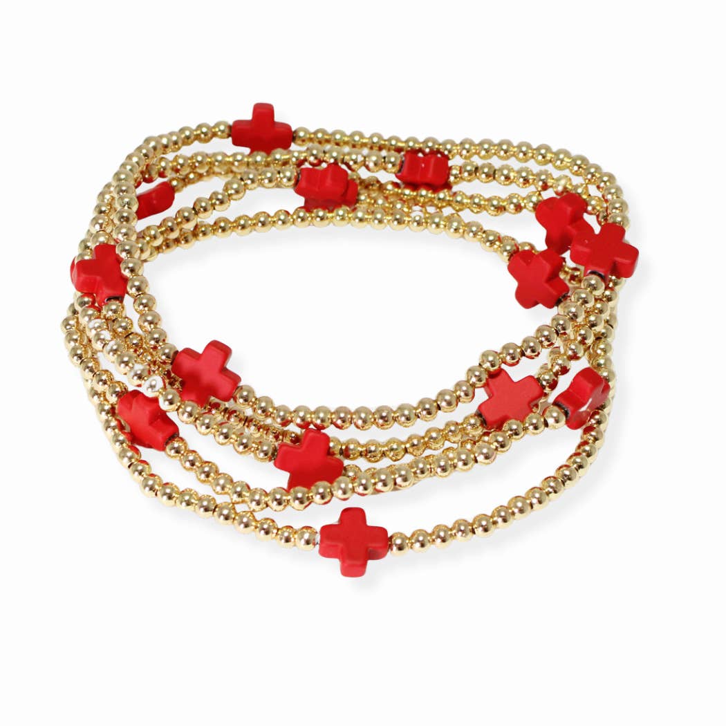 Multi layered gold bead stretch bracelet with cross accent n