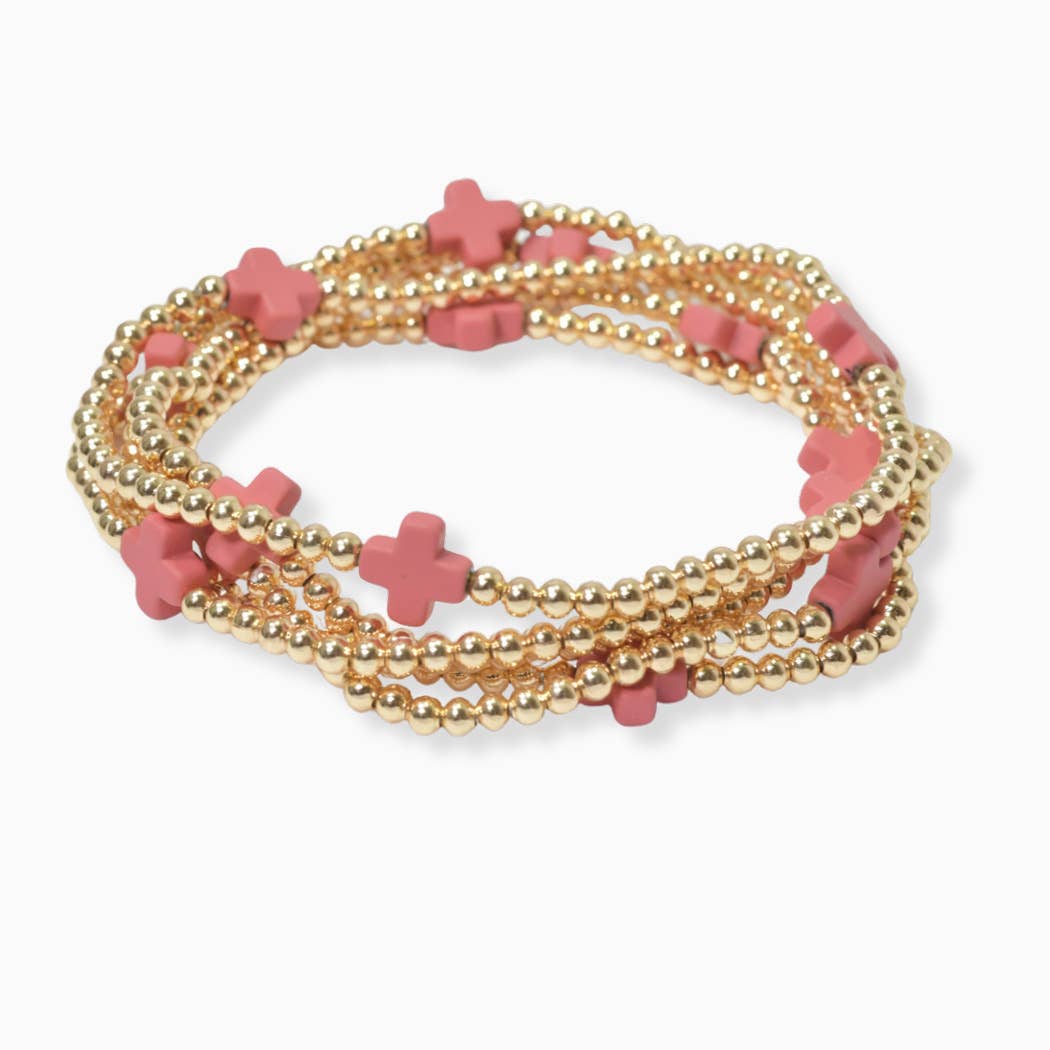 Multi layered gold bead stretch bracelet with cross accent n