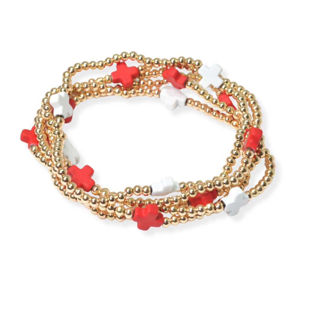 Multi layered gold bead stretch bracelet with cross accent n