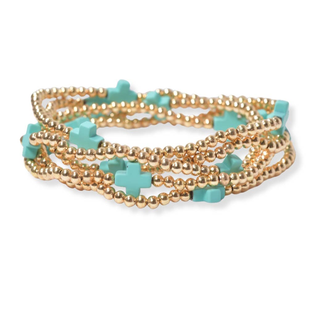 Multi layered gold bead stretch bracelet with cross accent n