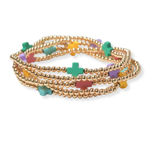 Multi layered gold bead stretch bracelet with cross accent n