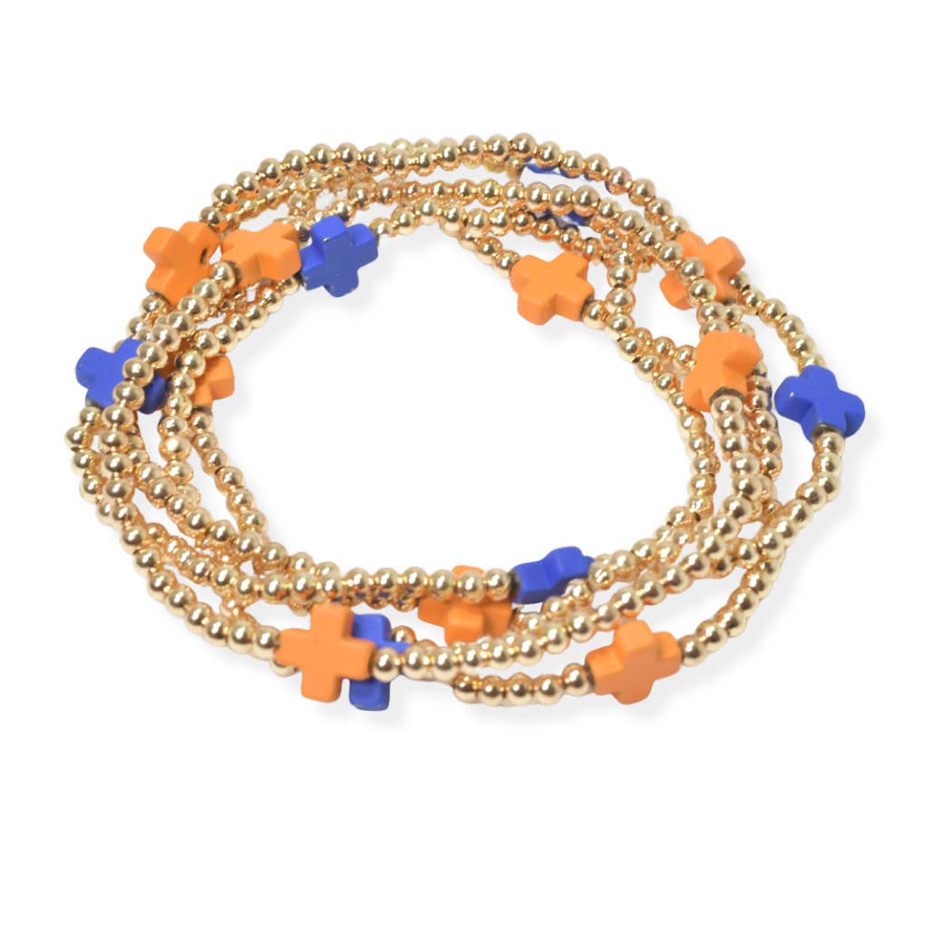Multi layered gold bead stretch bracelet with cross accent n